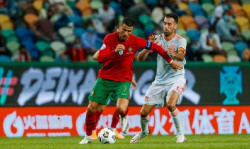 Espa&ntilde;a ense&ntilde;a dos caras en el empate de Lisboa